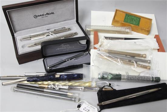 A group of assorted fountain pens, pencils and accessories